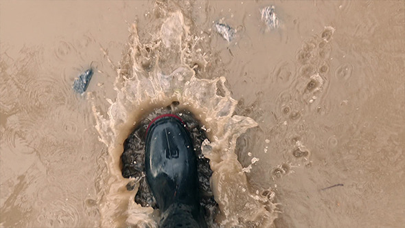 Rubber Boots Walking Through Water alt