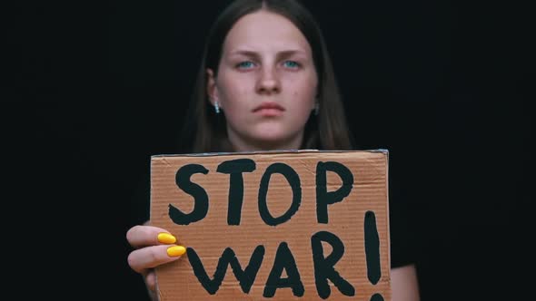 Upset Ukrainian Poor Girl Protesting Against the Military Conflict alt