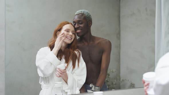 Interracial Couple After Morning Shower Enjoy Beauty Procedures
