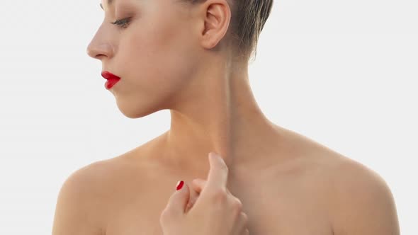 Young Woman with Virtually No Makeup. Foundation and Powder Are Applied on the Face. Blond Girl in alt