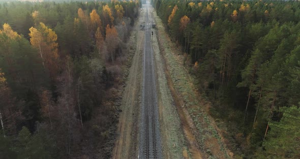 Empty Railroad in Forest Aerial Shot alt