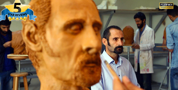 Student Working On Sculpture in Art Class alt