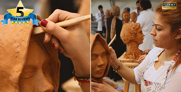 Student Working On Sculpture in Art Class alt