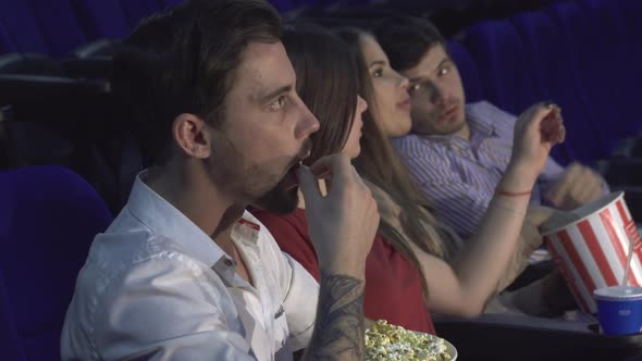 The Four Fellow Are Sitting at the Premiere of the Film at the Cinema alt