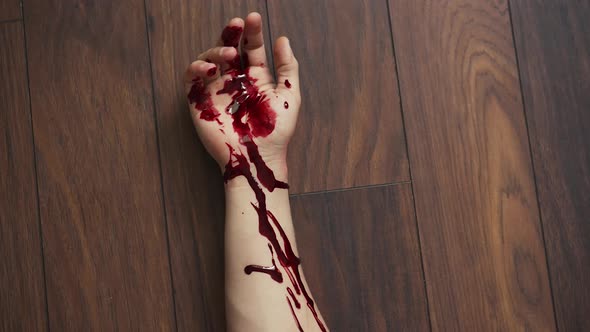 Bloody Hand Falls to the Floor alt