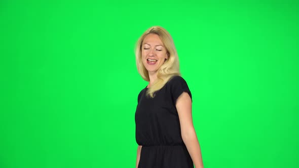 Girl Goes with Multicolored Paper Bags Enjoying Shopping. Chroma Key alt