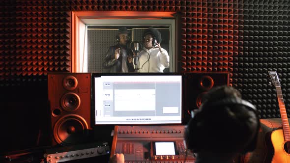 Singers Recording Song in Studio, Stock Footage | VideoHive