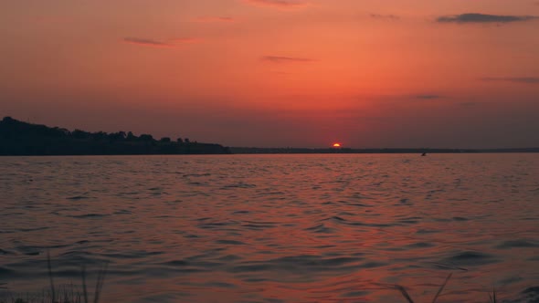 Sunset Beach View Summer Evening on River Sea or Ocean