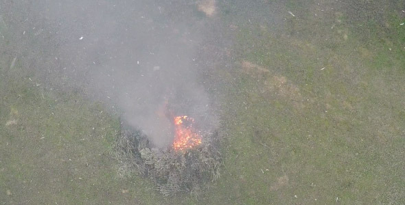 Smoke and Particles Above the Fire alt