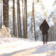 Man Walking in Winter Forest - VideoHive Item for Sale