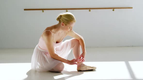 Ballerina wearing ballet shoes alt