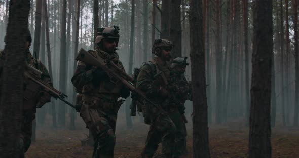 Fully Equipped Soldiers Wearing Camouflage Uniform Attacking Enemy Rifles Ready to Shoot Military alt