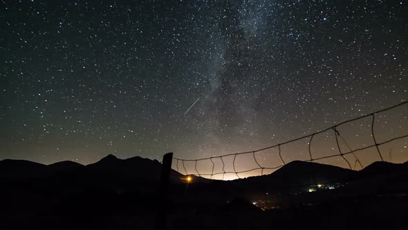 Starry Night Sky with Milky Way Galaxy over Mountains alt