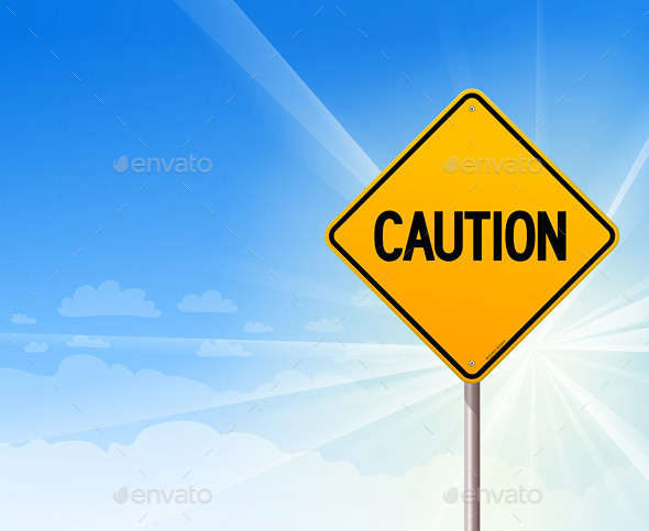 Caution on Blue Sky Background - Travel Conceptual