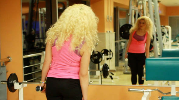 Girl Doing Sports In A Gym, Fitness Center 24