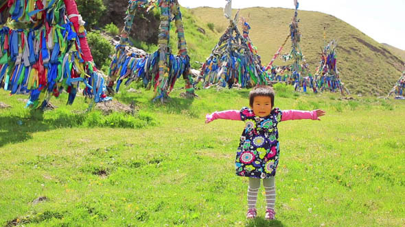 Mongolian Girl Posing In Front Of Shaman Adak