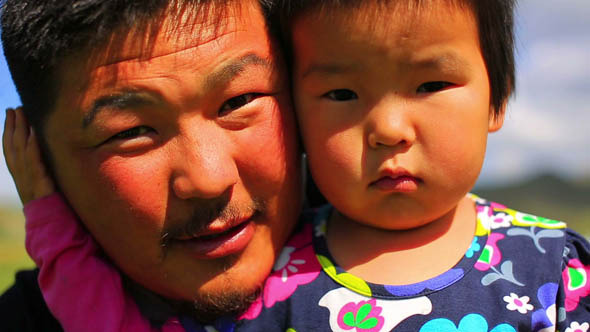 Mongolian Father Posing With His Daughter