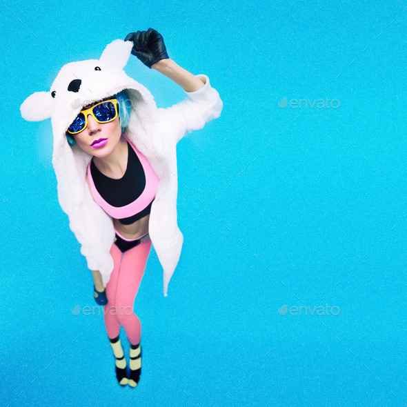 Funny party girl in hoodie bear on a blue background. Bright win Stock
