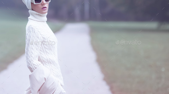 Portrait stylish lady in white glamorous clothes. Fall Winter fa - Stock Photo - Images