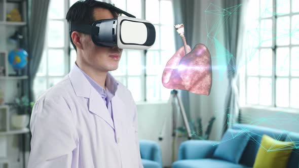 Male Doctor Using Vr Glasses Virtual Reality Touching 3D Human Lung Holographic alt
