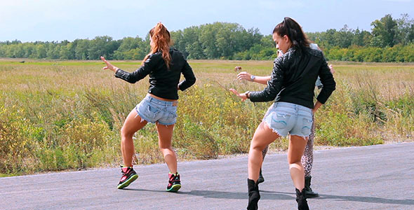 Three Girls Dancing On The Road 3