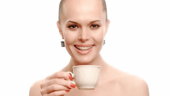 Woman Drinking Coffee And Smile