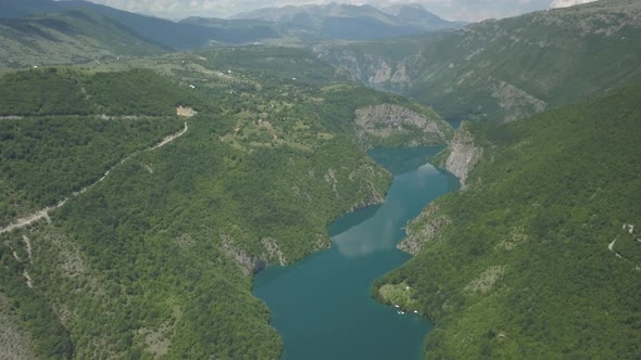 Aerial view of mountains and Piva lake in Montenegro in summer time alt