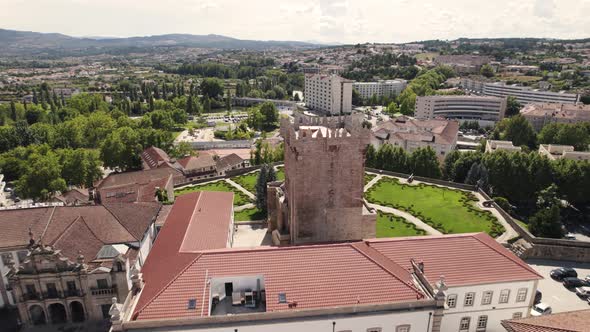 Aerial approaching the keep of Castle of Chaves, Portugal. Landmark fortified tower. alt