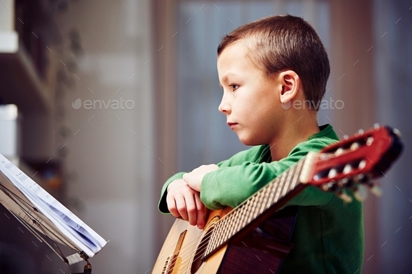 Little guitarist - Stock Photo - Images