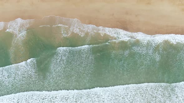 Drone shots waves splashing water to texture background.