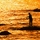 Fisherman With Spinning Silhouette At Sea Sunset - VideoHive Item for Sale