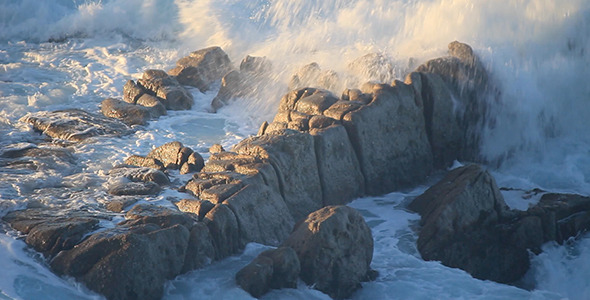 Waves Wash over Ocean Rocks near Monterey