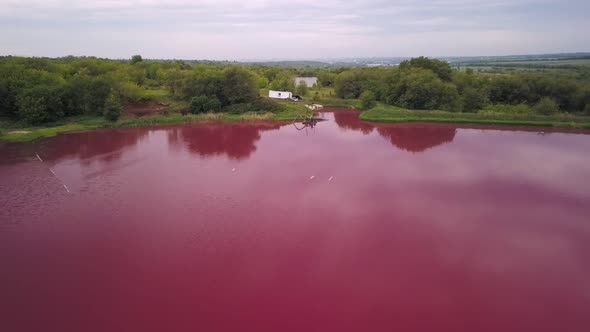 Toxic Pink Lake at Nature, Industrial Zone with Pollution, Aerial Shot