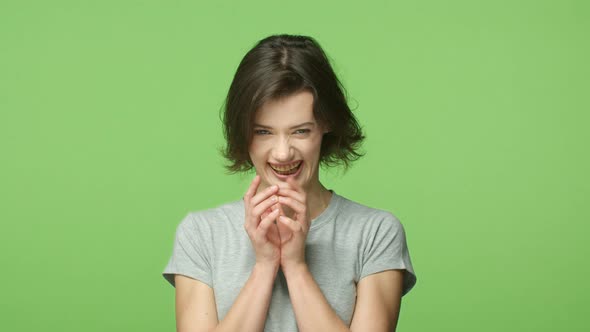 Slowmotion Devious Evil Genius Young Woman Have Perfect Plan Wear Braces Smiling Sly Steeple Fingers alt