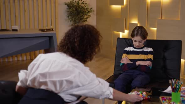 Boy Patient Refusing to Work with Psychologist alt