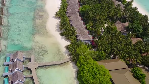 Aerial drone abstract of coast beach by blue lagoon with sand background alt