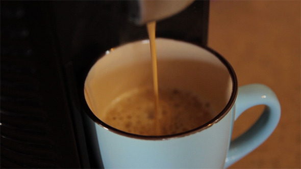 Close Up of Coffee Running Into Mug