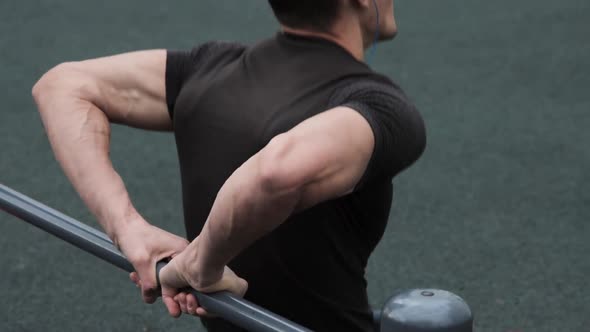 Man training outdoors on sports field