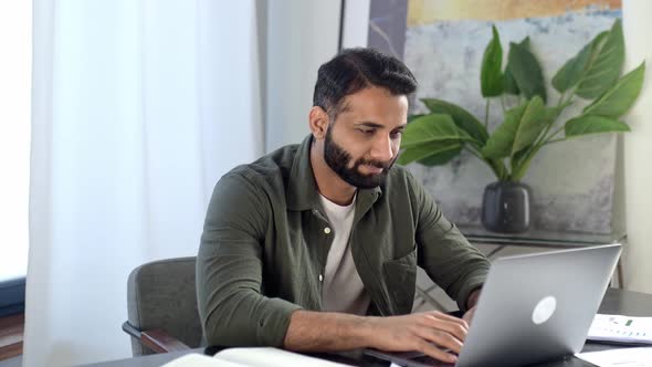 Portrait of a Charismatic Confident Indian or Arabian Man Stylishly Dressed Entrepreneur Freelancer alt