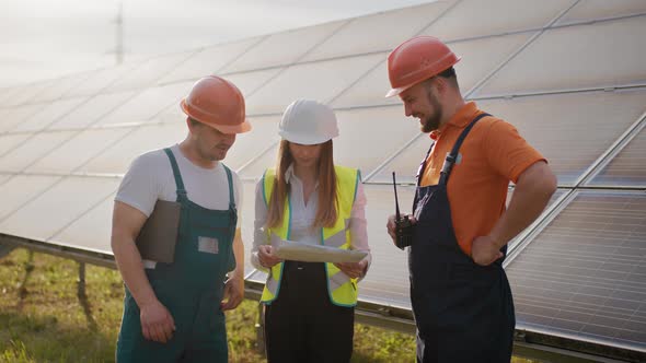 Beautiful Female Technologist in Uniform with Protective Helmet alt