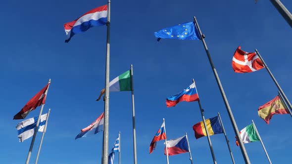 Flags of european countries waving in the wind alt