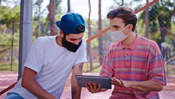 Coronavirus Concept Two Guys Meeting in the Park alt