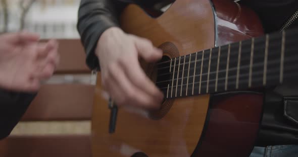 Musician Playing the Guitar