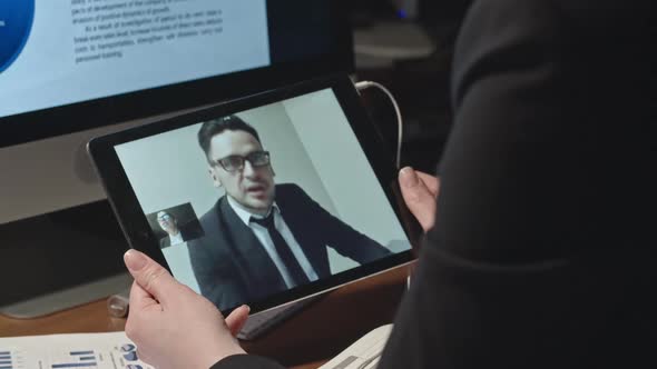 Partners Cooperating Via Video Call alt