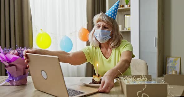 Celebrating Online with Relatives Via Laptop Video Links Birthday Through Pandemic Old Grandmother alt