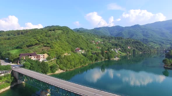 Aerial view of bridge over water without traffic alt