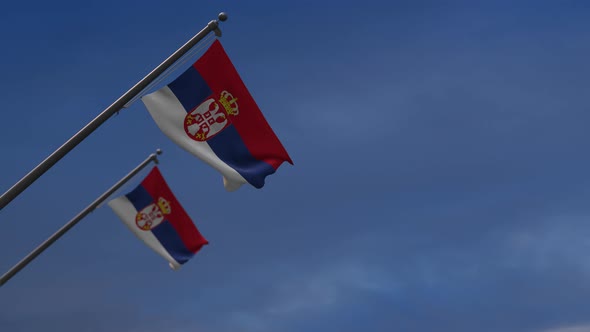 Serbia Flags In The Blue Sky - 4K