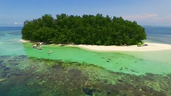 A Tropical Hideaway with Powder-white Beaches and Pristine Coral Reefs. alt