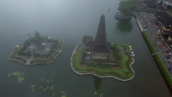 Aerial footage of Pura Ulun Danu water temple on lake Bratan, Island Bali, Indonesia