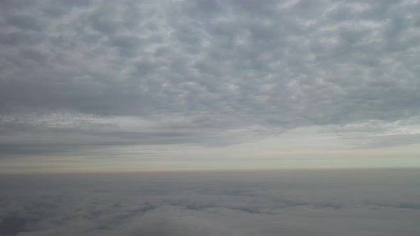  Panorama of the sky with dense gray clouds at sunset